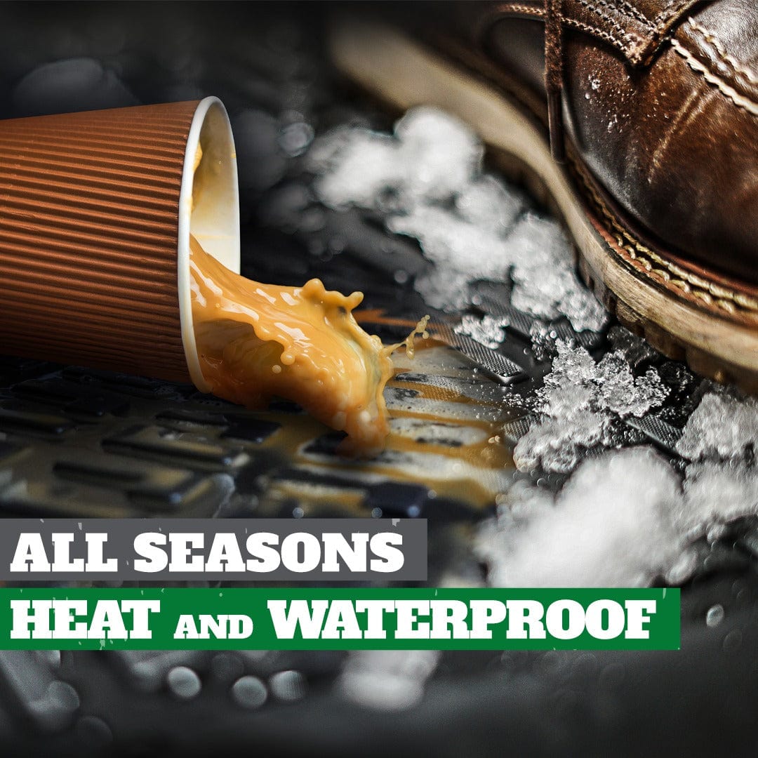 A cup of coffee mid-spill onto the floor of a car with a floor mat. There is a boot next to the spilled coffee with slushy snow surrounding it.