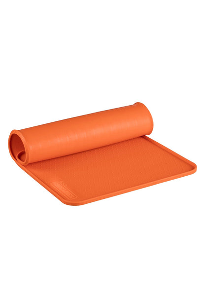 Silicone Pet Feeding Mat in orange rolled up.