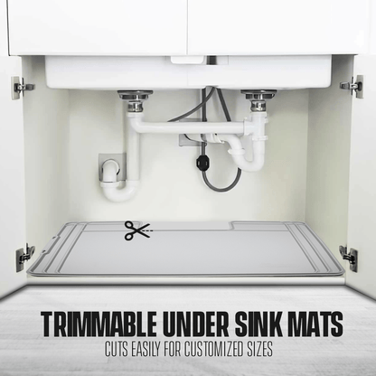 The mat under a sink showing that it is able to be trimmed to customize it for any sink size. 